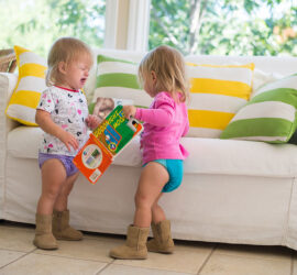 They giggle and cuddle but also scuffle and grapple . Twin toddlers fighting is inevitable. How can you handle them without getting insane?